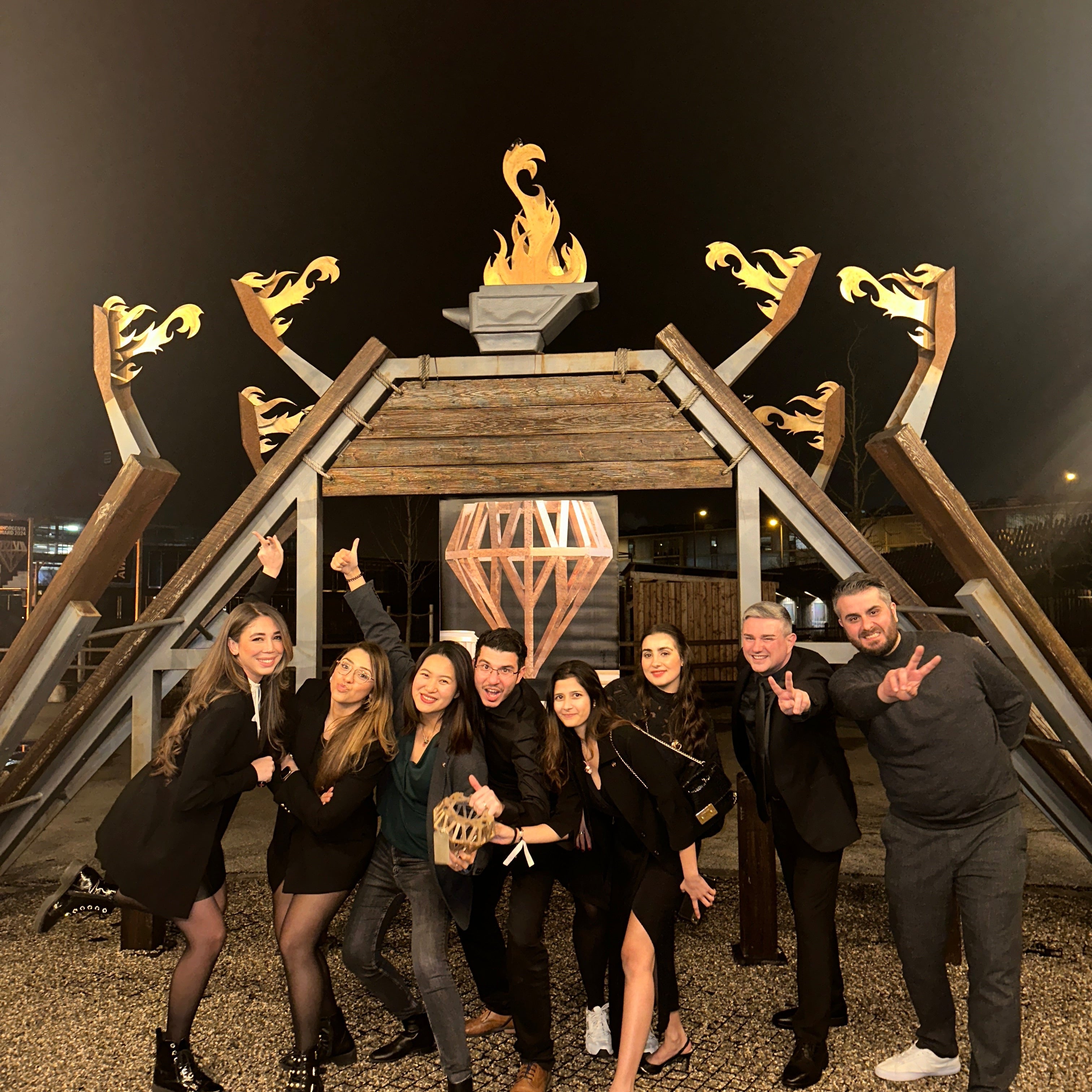 Seinerzeit team celebrating and posing after winning the Inhorgenta Fashion Jewelry of the Year 2024 award, holding trophy