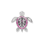 Colorful turtle in rhodium-plated silver with a pink and fuchsia enamel shell and sparkling zirconia, inspired by vibrant aquatic worlds