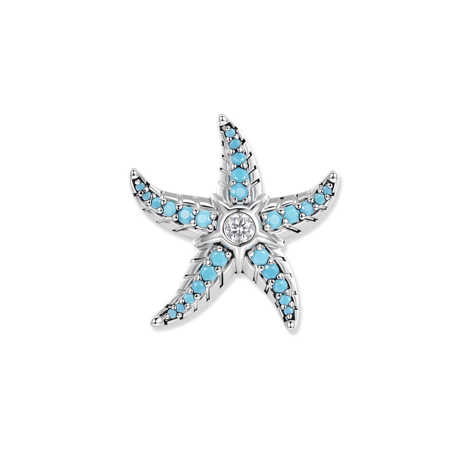 Stella marina in argento con zirconi color turchese sui bracci e una pietra scintillante al centro, ispirata alle acque cristalline del mare.