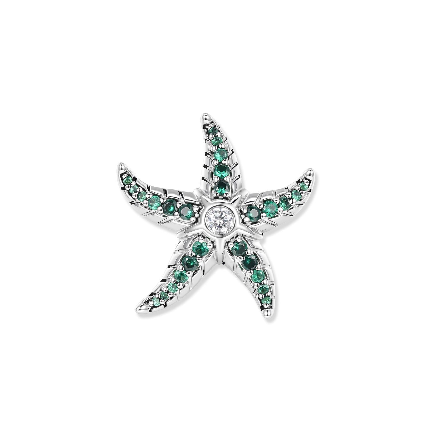 Silver starfish with rich green zirconia in its arms and a sparkling stone in the center, inspired by calm, natural aquatic worlds