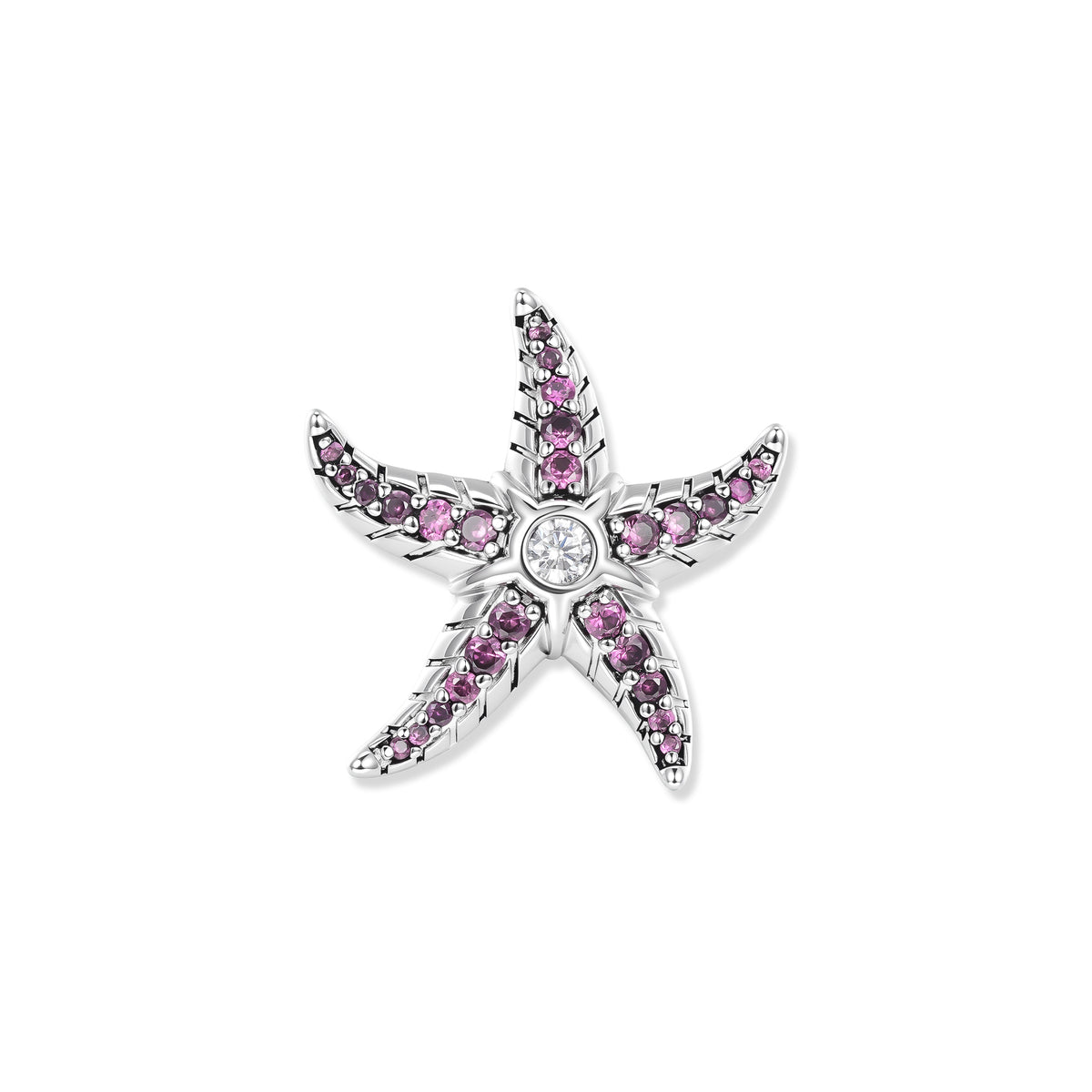 Silver starfish with pink and fuchsia cubic zirconia in the arms and a sparkling stone in the center, inspired by colorful underwater worlds
