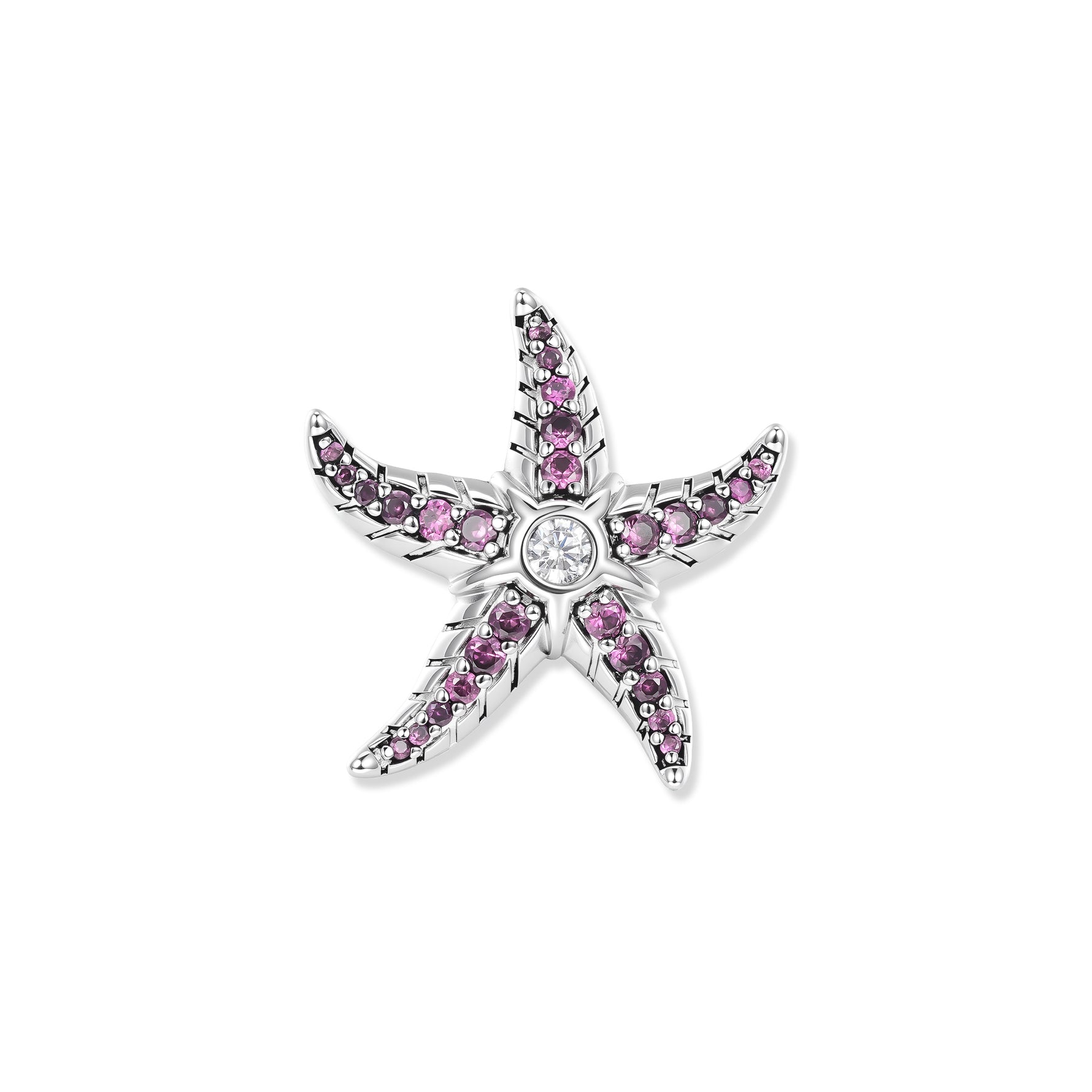 Silver starfish with pink and fuchsia cubic zirconia in the arms and a sparkling stone in the center, inspired by colorful underwater worlds