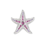 Large silver starfish with pink and violet zirconia and fine white highlights, intricately crafted as a masterpiece of the underwater world